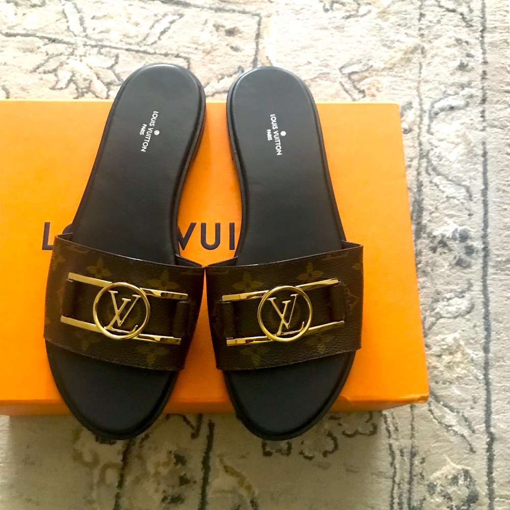 Brand new designer LV sandals that has never been worn.